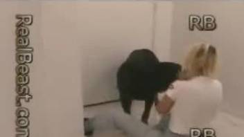 Blond-haired beauty gets fucked by a big-dicked dog