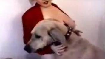 Wife moans of lust with the dog's cock fucking her very hard