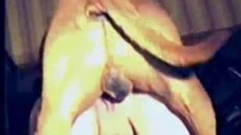 Horny dog fucks mature woman in both her tiny holes