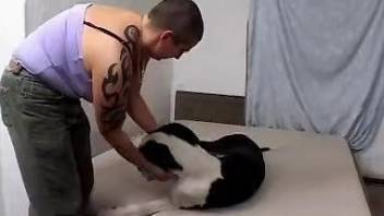 Buzzcut bitch rides a dog's red cock in a hot scene