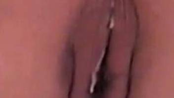 Closeup view of a wife's pussy filled with dog sperm