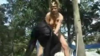 Carnival beauty tires to seduce a big-dicked ape
