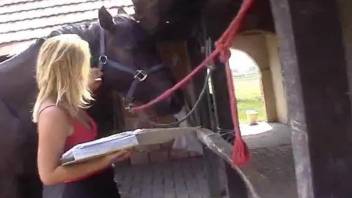 Blond-haired beauty with big boobs cums on horse cock