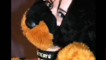 Sexy babe in a fursuit getting pounded on all fours by a dog